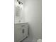 Updated bathroom with white vanity, marble countertop, and a framed mirror at 195 Pine Shadow Dr, Goose Creek, SC 29445