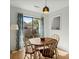 Bright dining area with round table and four chairs at 195 Pine Shadow Dr, Goose Creek, SC 29445