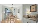 Dining area with round table and four chairs, near sliding door at 195 Pine Shadow Dr, Goose Creek, SC 29445