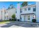 Light blue two-story home with parking and landscaping at 195 Pine Shadow Dr, Goose Creek, SC 29445