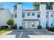 Light blue two-story home with parking and landscaping at 195 Pine Shadow Dr, Goose Creek, SC 29445