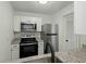 Modern kitchen with stainless steel appliances and granite countertops at 195 Pine Shadow Dr, Goose Creek, SC 29445