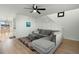 Living room with gray sectional sofa and access to dining area at 195 Pine Shadow Dr, Goose Creek, SC 29445