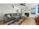 Living room with gray sectional sofa and a fireplace at 195 Pine Shadow Dr, Goose Creek, SC 29445