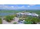 Aerial view of townhomes, pool, and waterway at 2111 Tides End Rd, Charleston, SC 29412