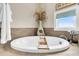 Bathroom featuring a large, round soaking tub at 2111 Tides End Rd, Charleston, SC 29412