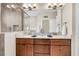 Double vanity bathroom with a walk-in shower and large mirror at 2111 Tides End Rd, Charleston, SC 29412