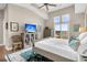 Main bedroom with a king-size bed, TV, and access to balcony at 2111 Tides End Rd, Charleston, SC 29412
