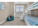 bedroom with a white bunk bed and ocean-themed decor at 2111 Tides End Rd, Charleston, SC 29412
