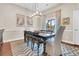 Dining room features a table with seating for six and access to balcony at 2111 Tides End Rd, Charleston, SC 29412