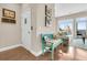 Inviting entryway with teal bench and coat rack, near living room at 2111 Tides End Rd, Charleston, SC 29412