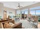 Living area features hardwood floors, fireplace, and access to balcony at 2111 Tides End Rd, Charleston, SC 29412