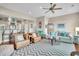 Living room with hardwood floors, comfortable seating, and open kitchen view at 2111 Tides End Rd, Charleston, SC 29412