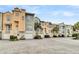 Row of townhomes with garages and landscaping at 2111 Tides End Rd, Charleston, SC 29412