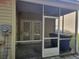 Screened porch with double doors and ceiling fan at 4743 Skillmaster Ct, North Charleston, SC 29418