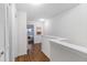 Light hallway with wood flooring, leading to bedrooms at 4796 Champion Way # C, North Charleston, SC 29418