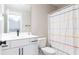 Clean bathroom with white vanity and colorful shower curtain at 655 Black Pine Rd, Moncks Corner, SC 29461
