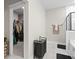 Bathroom with walk-in closet and marble floors at 655 Black Pine Rd, Moncks Corner, SC 29461