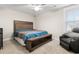 Bright bedroom with a queen bed and recliner at 655 Black Pine Rd, Moncks Corner, SC 29461