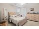 bedroom with light wood bed and full-length mirror at 655 Black Pine Rd, Moncks Corner, SC 29461