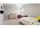 bedroom with dinosaur bedding and dresser at 655 Black Pine Rd, Moncks Corner, SC 29461