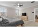 Spacious bedroom with large windows, plush carpeting, and a dresser at 655 Black Pine Rd, Moncks Corner, SC 29461
