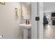 Powder room with pedestal sink and decorative mirror at 655 Black Pine Rd, Moncks Corner, SC 29461