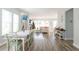 Open concept living and dining area with hardwood floors at 107 Garden Lily Ln, Summerville, SC 29485