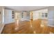 Open living room with hardwood floors and built-in shelving at 1109 Somerset Ct, Mount Pleasant, SC 29464