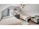 Bright bedroom with two twin beds and colorful rug at 132 Spring St, Charleston, SC 29403