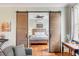 Bright bedroom with wood floors and a comfortable bed at 132 Spring St, Charleston, SC 29403