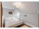 Cozy attic bedroom with a double bed and simple decor at 132 Spring St, Charleston, SC 29403