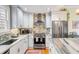 Modern kitchen with stainless steel appliances and granite countertops at 132 Spring St, Charleston, SC 29403