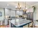 Updated kitchen with white cabinets, granite countertops and stainless steel appliances at 132 Spring St, Charleston, SC 29403