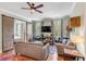 Spacious living room with hardwood floors, a large TV, and comfortable seating at 132 Spring St, Charleston, SC 29403