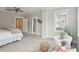 Bright bedroom with carpeted floor, large window, and ample closet space at 1363 Rivella Dr, Mount Pleasant, SC 29464