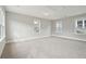 Large bedroom with multiple windows and carpet flooring at 1363 Rivella Dr, Mount Pleasant, SC 29464