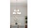 Close-up view of a modern, silver chandelier at 1363 Rivella Dr, Mount Pleasant, SC 29464