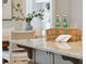 Kitchen island with granite countertop and beverage/napkin caddy at 1363 Rivella Dr, Mount Pleasant, SC 29464