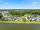 Community overview showing houses near a lake at 153 Belfort Pl, Summerville, SC 29486