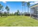 Spacious backyard with screened porch overlooking pond at 153 Belfort Pl, Summerville, SC 29486