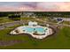 Aerial view of community pool, playground, and homes at 153 Belfort Pl, Summerville, SC 29486