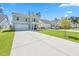 Two-story home with attached garage and porch at 153 Belfort Pl, Summerville, SC 29486