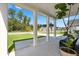 Covered porch with seating area overlooking the street at 153 Belfort Pl, Summerville, SC 29486
