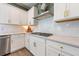 Well-equipped kitchen with gas cooktop and white shaker cabinets at 153 Belfort Pl, Summerville, SC 29486