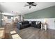 Comfortable living room features a sectional sofa and wood flooring at 153 Belfort Pl, Summerville, SC 29486