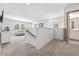 Versatile loft area with carpet, a couch, and built in shelving at 153 Belfort Pl, Summerville, SC 29486