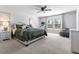 Large main bedroom with carpeted floor, plush bedding, and plenty of natural light at 153 Belfort Pl, Summerville, SC 29486