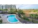 Community pool with ample lounge chairs and marsh views at 155 Wingo Way # 424, Mount Pleasant, SC 29464
