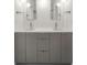 Bathroom with a double vanity and quartz countertop at 1579 E Ashley Ave, Folly Beach, SC 29439